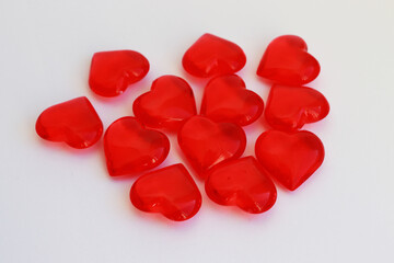 red three-dimensional hearts on a white background