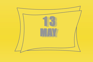 calendar date in a frame on a refreshing yellow background in absolutely gray color. May 13is the thirteenth day of the month