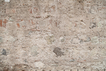wall stone texture, old house wall background formed by rocks and stones