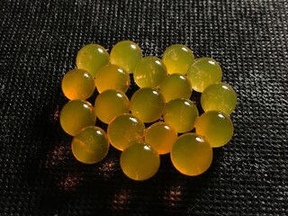molecular spheres on a white plate. high modern cuisine.