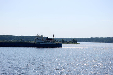 cargo ship on the river Volga in summer time