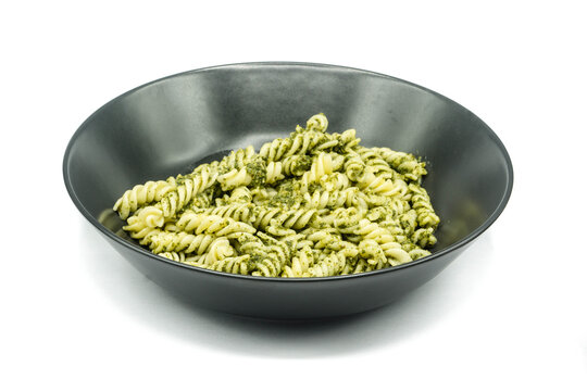 Plate Of Pasta With Pesto Isolated On White Background