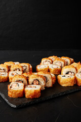 set of rolls on a black textured background