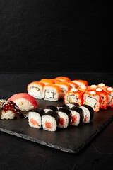 set of rolls on a black textured background