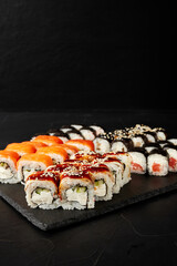 set of rolls on a black textured background