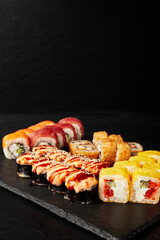 set of rolls on a black textured background