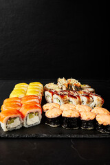 set of rolls on a black textured background