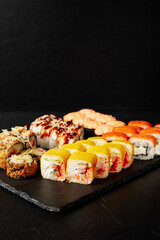 set of rolls on a black textured background