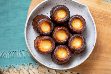 A plate of Canelés de Bordeaux