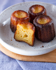 A plate of Canelés de Bordeaux