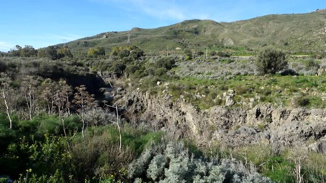 medieval bridge in Sicily of architecture in norman times on Simeto River (pan and zoom)