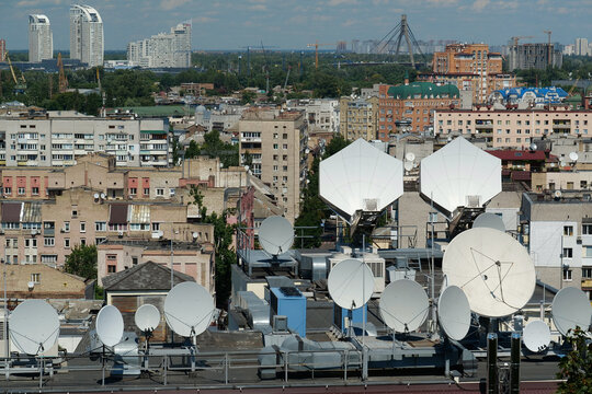 Satellite dishes on house roof
