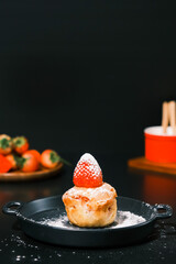 Homemade Strawberry cake topping with icing sugar. Sweet food. Sweet dessert. perfect summer season dessert served on plate.