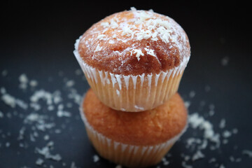 Sweet cupcakes on black table