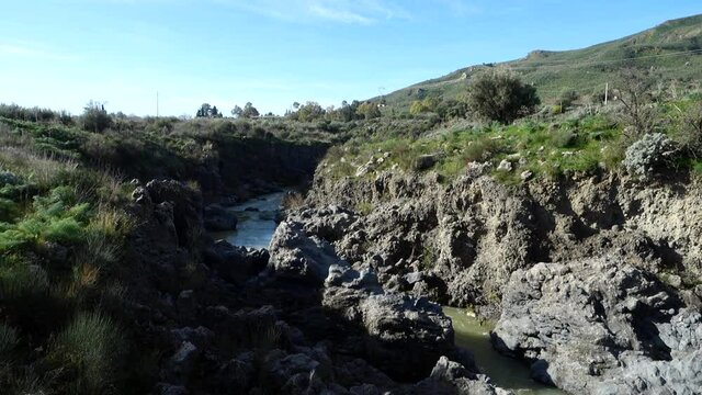 medieval bridge in Sicily of architecture in norman times on Simeto River (pan)
