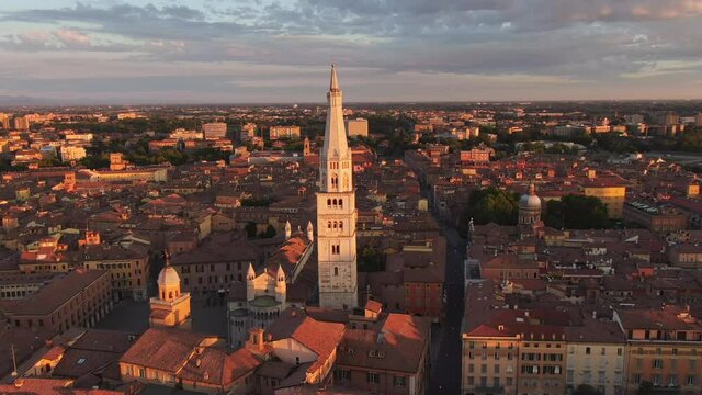 aerial view of modena cathedral and city center at sunrise,cityscape drone shot at dawn
