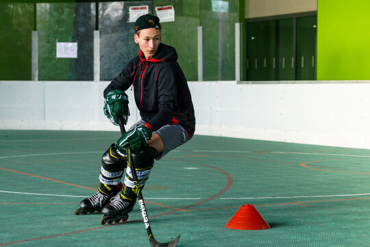 Inline skating, young man skating inline