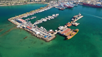 Aerial drone photo of small port next to shipyard and ship repair area of Perama next to island of Salamina, Attica, Greece