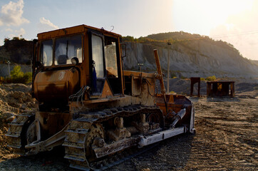 Fototapeta premium excavation truck excavator gravel sand blue sky sun summer construction work