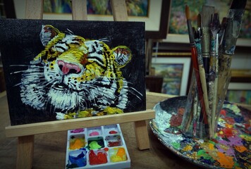 Art painting oil color Smiling cute Tiger Thailand , Palette , paintbrush 