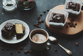 Cup of coffee and small waffle cakes, vintage stylization