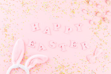 Happy Easter Greeting card with the inscription on a pink paper background.Concept of festive greeting