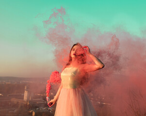 Beauty girl colored smoke