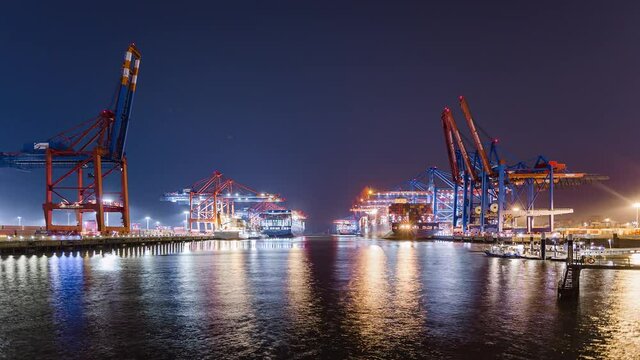 Container ship loading and unloading in deep sea port, Low angle View of business logistic import and export freight transportation by container ship, Container loading cargo freight ship, Time Lapse