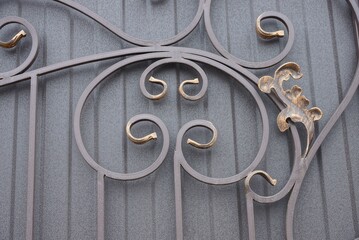 brown metal texture of iron wall and forged in a pattern