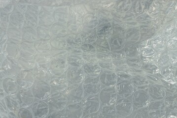plastic gray white texture from a piece of cellophane in a package