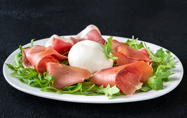 Antipasto with prosciutto and mozzarella