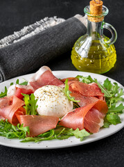 Antipasto with prosciutto and mozzarella