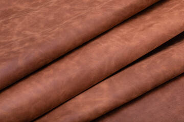 Natural folded  spotty brown cow leather