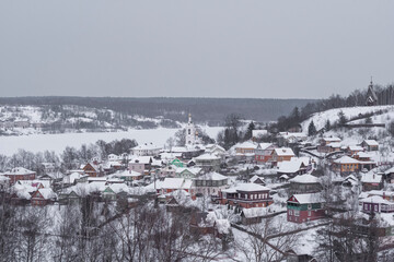 Fototapeta na wymiar urban winter landscape view from the mountain