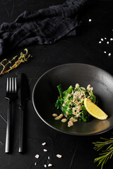 funchose in a black plate on a dark textured background