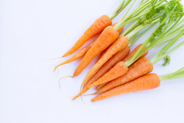 Fresh carrots on white background.