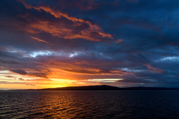 Fototapeta na wymiar Argentina, Tierra del Fuego, Beagle Channel at sunset.