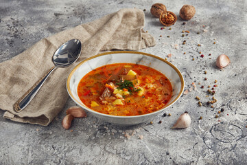 Georgian traditional soup kharcho in the ceramic bowl