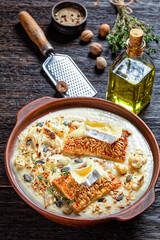 creamy vegan cauliflower soup in a bowl