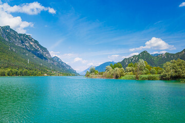 Fototapeta na wymiar Summer at lake Idro Italy. Nature landscape for adventure, hiking and recreational tourism.