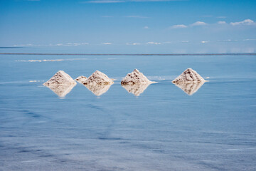 Salt cones on the reflected surface of the salt flat, Salar de Uyuni, Potosi Department, Bolivia