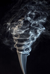Abstract puffs of smoke on a black background.