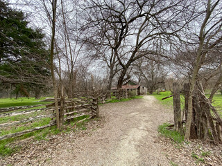 Fence-lined rural dirt road