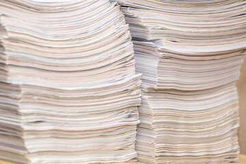 pile of paper documents in the office. waste paper, paper trash