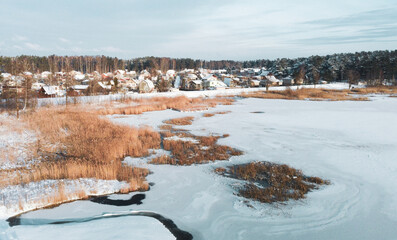 village by the lake in winter