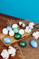 painted chicken eggs easter tradition holiday blue background