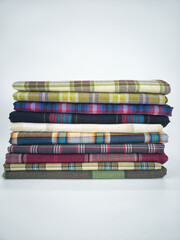 Naklejka premium Sarongs or locally known as kain pelikat, worn by most Asian men. Selective focus points