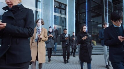 Successful Group of Interconnected Business People Walking Street using Smartphone Sending Data Up into the World Wide Connected Social Network. Diverse People Use Internet to do E-Business - Powered by Adobe