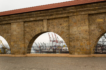 old town architecture with sea port Odessa city shipping industrial terminal Ukraine