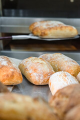Craft bread on the table at the bakery. The concept of small industries and healthy food